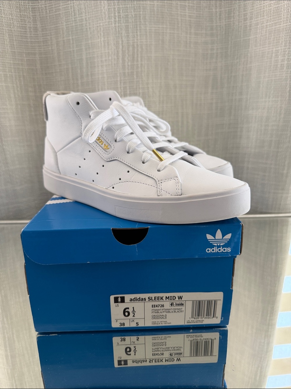 adidas “sleek mid” white sneakers